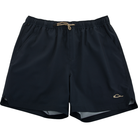 Lake Shore Dock Short with elastic waistband, drawstring, side pockets, and logo on hem, designed for lightweight comfort and water resistance.