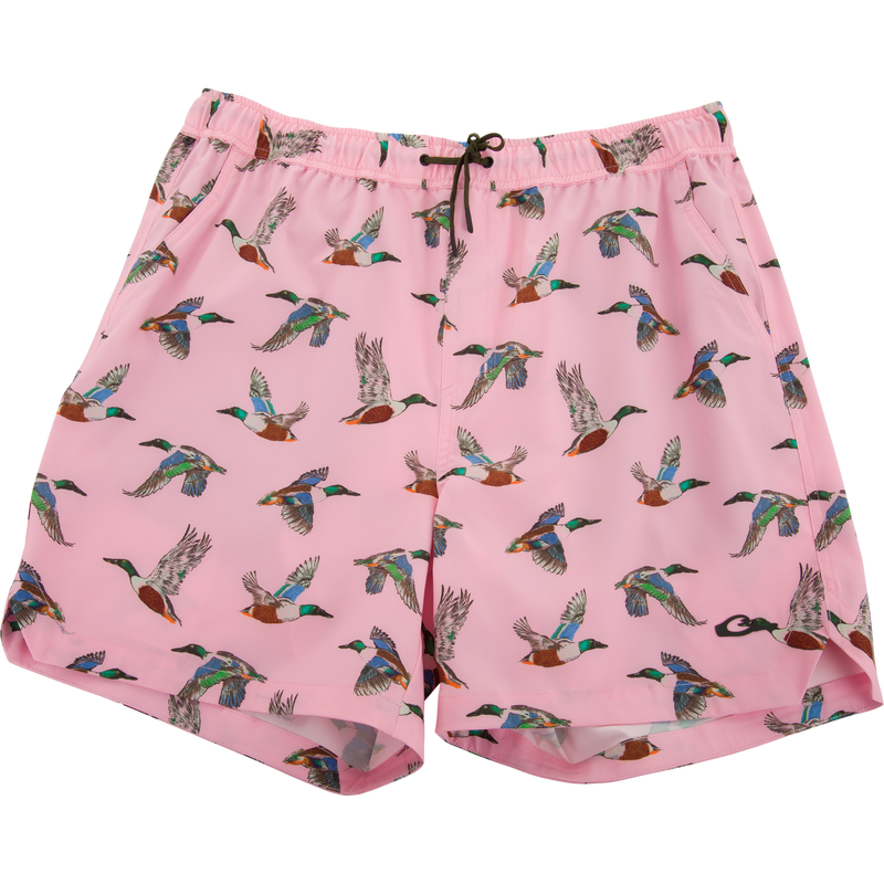 Lake Shore Dock Short with flying duck print, elastic drawstring waistband, mesh-lined and zippered pockets, designed for comfort and movement during water activities.