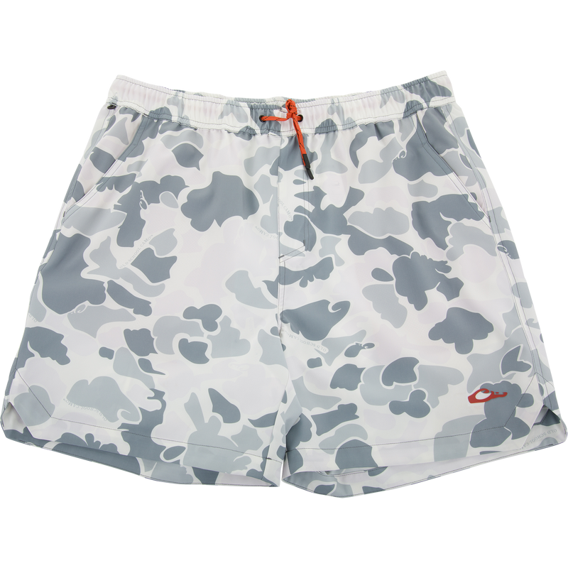 Lake Shore Dock Short featuring a white-gray camo pattern, elastic waistband with orange drawcord, mesh-lined pockets, and a red logo on the hem.