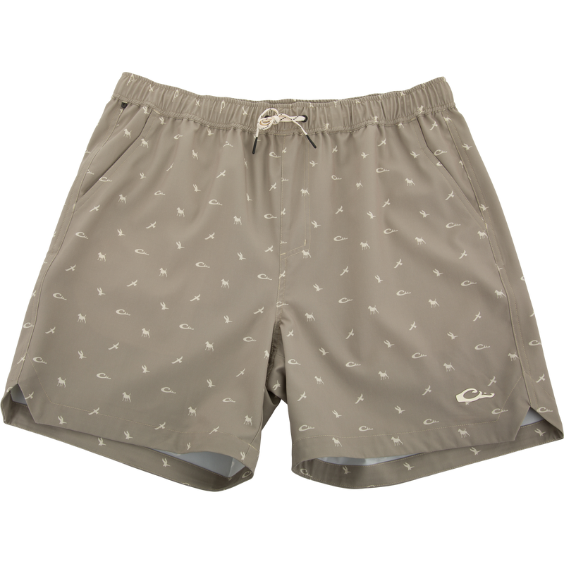 Lake Shore Dock Short with elastic waistband, drawstring, micro-print design, mesh-lined front pockets, and zippered side pocket, ideal for water activities and outdoor comfort.
