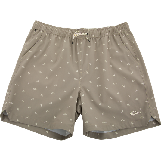 Lake Shore Dock Short with elastic waistband, drawstring, micro-print design, mesh-lined front pockets, and zippered side pocket, ideal for water activities and outdoor comfort.