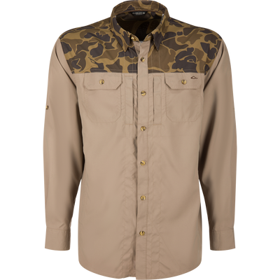 Wingshooter Trey Shirt with camouflage yoke, two chest pockets, and roll-up sleeves, designed for comfort and performance in warm outdoor conditions.