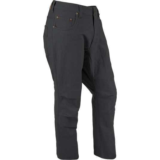 A pair of Canvas Pants made from lightweight cotton canvas with metal rivet accents on the pockets and reinforced knees.