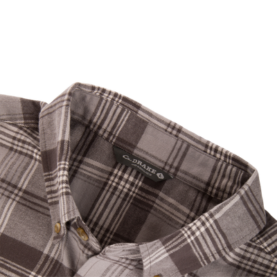 Close-up of a folded Drake Autumn Flannel Shirt, featuring a plaid pattern with button-down collar and chest pocket, emphasizing outdoor style and comfort.