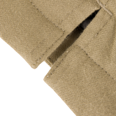 The Youth Campfire Flannel Hoodie features a close-up of the herringbone fabric, highlighting pocket stitching and dark lining, embodying Drake Waterfowl's durable outdoor style.