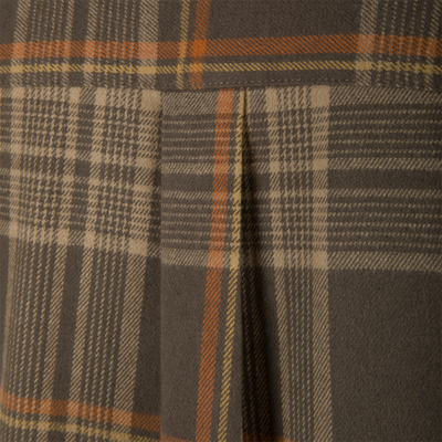 Close-up of the Legacy Flannel Plaid Shirt, showcasing gray/brown woolen fabric with orange and yellow over-checks, highlighting the detailed stitching and vent line.