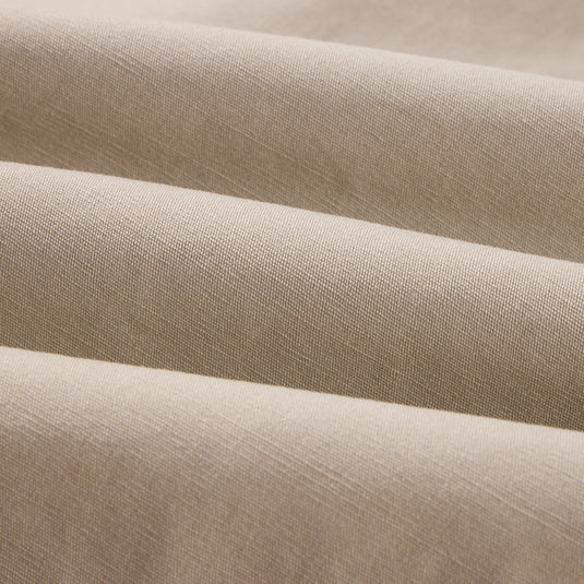 Close-up of the Campfire Canvas Shirt Jac Hoodie, showcasing the soft, woven fabric texture, perfect for warmth and comfort in outdoor settings.