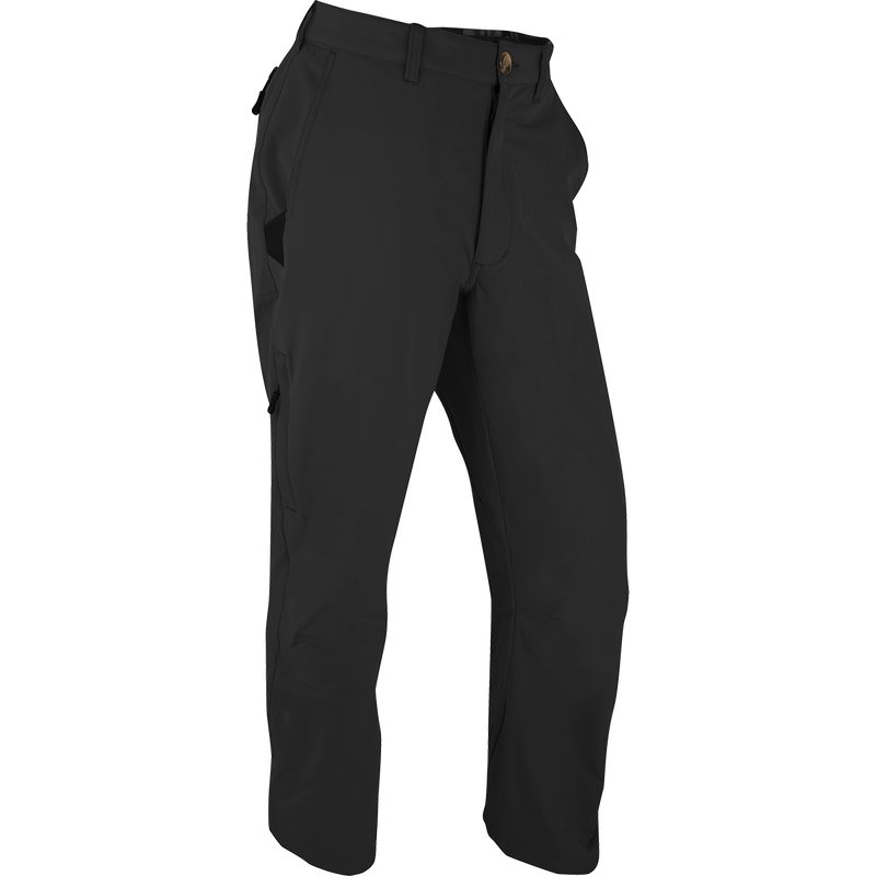 Alt text: Stretch Tech Pants by Drake Waterfowl: Durable black trousers with YKK zippers, cargo pockets, and moisture-wicking 4-way stretch for hunting and outdoor activities.