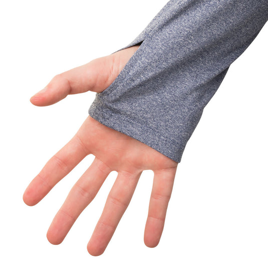 A close-up of the Microlite Performance 1/4 Zip Heather, featuring a hand with a grey sleeve and a thumb loop.