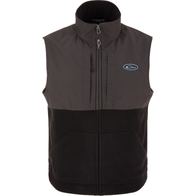 Eqwader Vest close-up showcasing mid-layer insulation, waterproof shoulders, breathable fleece lower torso, and secure chest pockets for valuables. Perfect for hunting and outdoor activities.