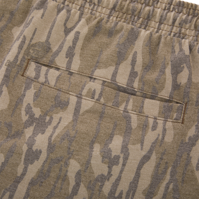 Close-up of the Tri-Blend Campus Short with camo-print, featuring an elastic waistband and welt pocket, highlighting its soft, stretchy, and quick-drying fabric.
