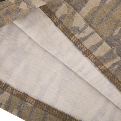 Close-up of Drake Tri Blend Campus Short showcasing inside-out serged seam and hem, highlighting the breathable, stretchy fabric blend for ultimate comfort.