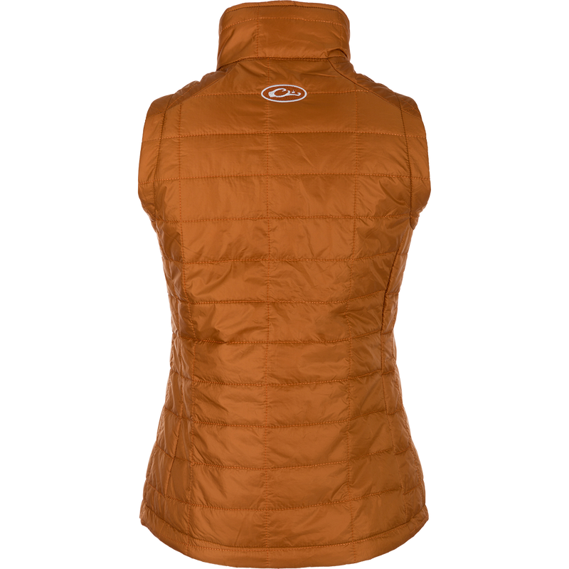 Women's Synthetic Down Pac-Vest - A close-up of a quilted vest with YKK zippered pockets and elastic cuffs. Stay warm and ready for adventure.