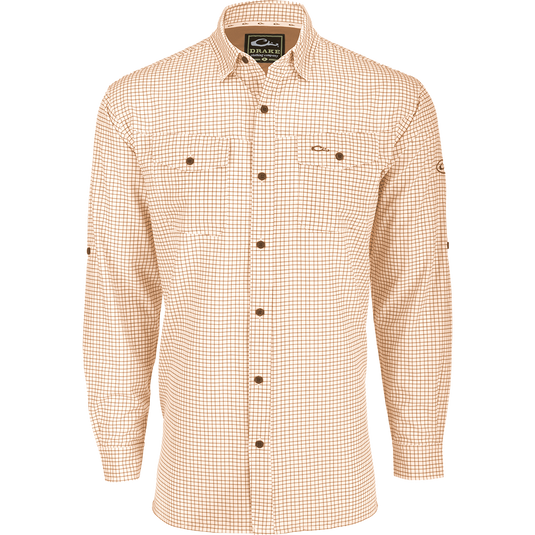A lightweight, Four Way Stretch long sleeve shirt with a checkered pattern. Perfect for the man on the go, whether on vacation or running errands. Features include hidden button-down collar, adjustable roll-up sleeves, and two chest pockets. From Drake Waterfowl.