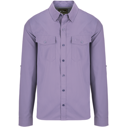Traveler's Solid Dobby Shirt L/S: Classic fit shirt with hidden button-down collar, chest pockets, and split tail hem. 100% Polyester, UPF30, moisture-wicking.