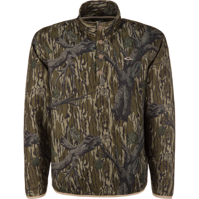 Delta Quilted Over Under Sweatshirt in a Mossy Oak Original Treestand tree-bark camouflage pattern, featuring heavyweight cotton polyester quilted fabric, a snap-button placket, and a high collar.