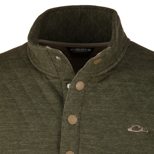 Lifestyle Delta Quilted Over Under Sweatshirt in olive green featuring a quilted texture, button-up placket, and mallard duck logo on the chest, crafted from heavyweight cotton polyester.