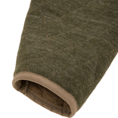 Close-up of a dark olive quilted Delta Quilted Over Under Sweatshirt sleeve with brown trim at the cuff.