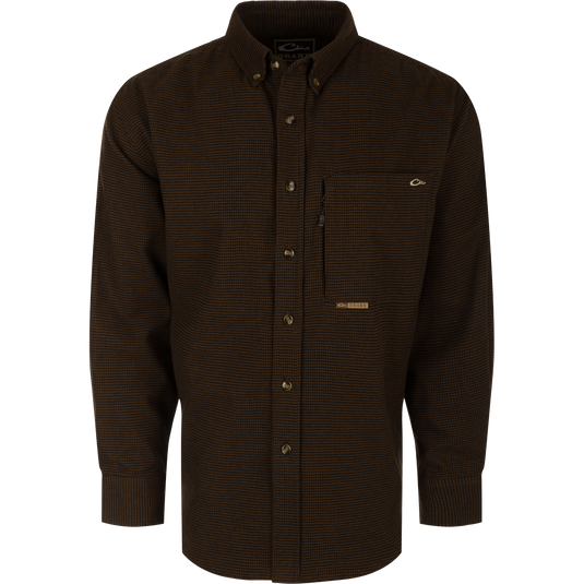A midweight, long-sleeved houndstooth shirt made from 100% brushed cotton twill. Features a button-down collar, back box pleat, and chest pockets. Perfect for cool weather.