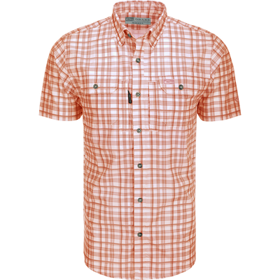 Hunter Creek Window Pane Plaid Shirt S/S: A lightweight, moisture-wicking shirt with hidden button-down collar, vented back, and chest pockets with zipper and Magnattach closure.