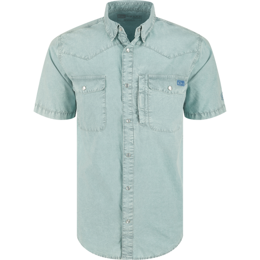 Cinco Ranch Western Acid Washed Short Sleeve Shirt with snap buttons, two flap pockets, utility pocket, and western yoke, ideal for versatile comfort and style.