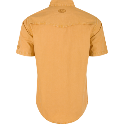Back view of the Cinco Ranch Western Acid Washed Short Sleeve Shirt, featuring rear yoke stitching, vented Western back cape, and upper center logo below collar.