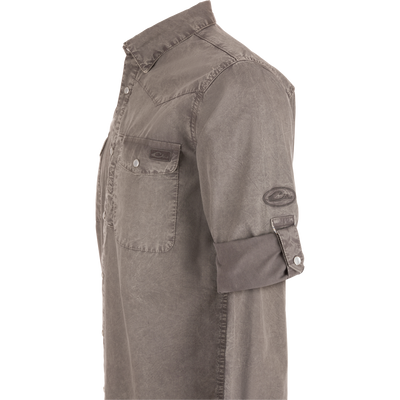 Cinco Ranch Western Solid Acid Wash Long Sleeve Shirt on mannequin, featuring western yoke, snap-button chest pockets, rolled sleeves, and subtle brand patches.