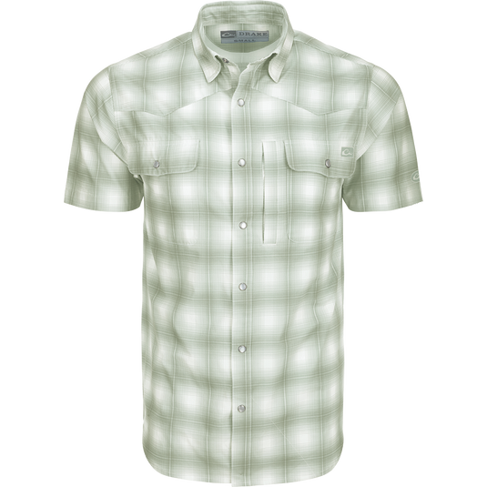 Cinco Ranch Western Plaid Shirt: A lightweight, moisture-wicking shirt with micro-mesh for natural cooling. Features include a hidden button-down collar, vented Western back, and two chest pockets with Magnattach closure. Perfect for hunting, fishing, or casual wear.