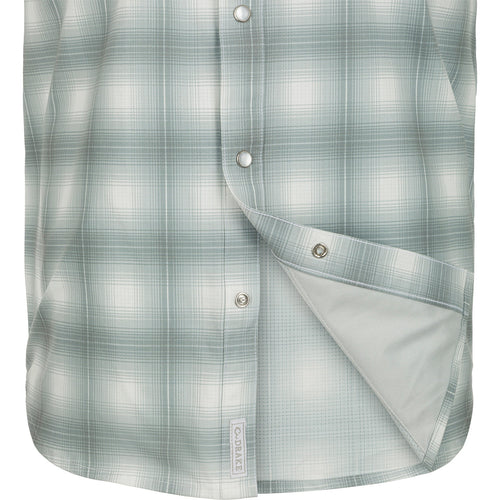 Cinco Ranch Western Plaid Shirt: Close-up of a lightweight, moisture-wicking shirt with micro-mesh for natural cooling. Features include UPF 30 sun protection, hidden button-down collar, and two chest pockets with Magnattach closure. Perfect for hunting, fishing, and outdoor activities.