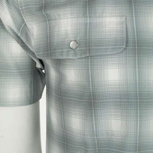 Cinco Ranch Western Plaid Shirt: A close-up of a lightweight, moisture-wicking shirt with a hidden button-down collar, vented back, and two chest pockets with snap closures.