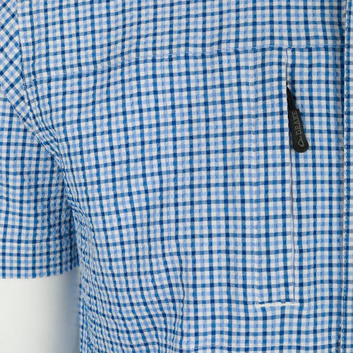 Close-up of the Drake Classic Seersucker Grid Check Shirt, featuring a hidden zippered chest pocket and a traditional button-down collar.