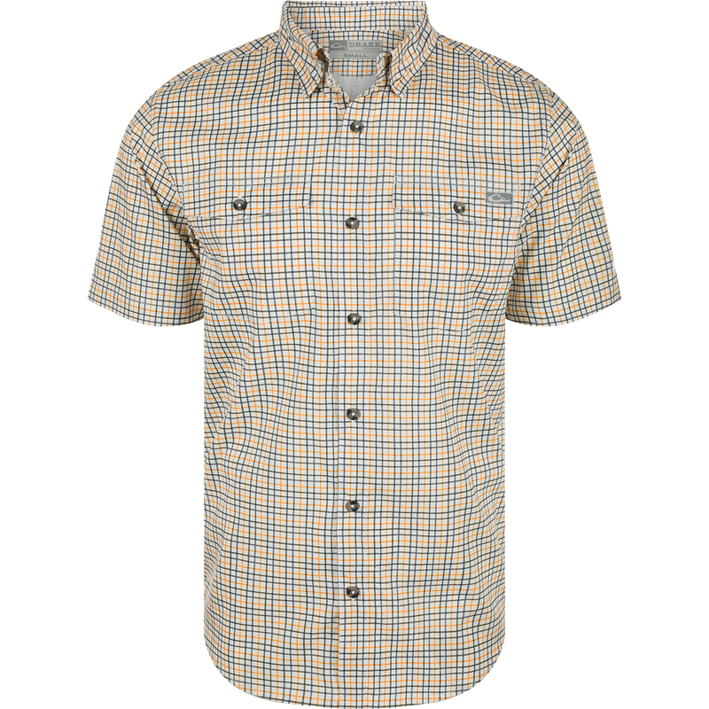 A white and orange plaid shirt with a hidden button-down collar, two button-through flap chest pockets, and a vented cape back. Made from lightweight performance fabric with UPF30 sun protection and moisture-wicking properties. Classic styling and technical features make the Frat Tattersall Shirt in a class of its own.