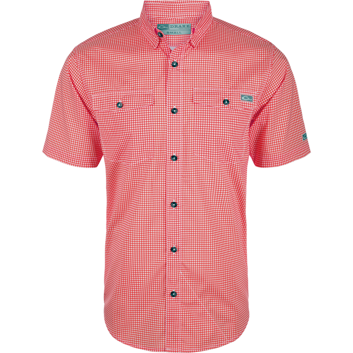 Frat Gingham Check Shirt S/S, a lightweight performance shirt with UPF30 sun protection, moisture-wicking fabric, and a hidden button-down collar. Features include vented cape back, button-through flap chest pockets, and sculpted hem with built-in sunglass wipe. Classic styling meets technical functionality.