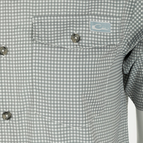 Frat Gingham Check Shirt S/S: A close-up of a checkered shirt with a stylish pattern and buttoned collar.