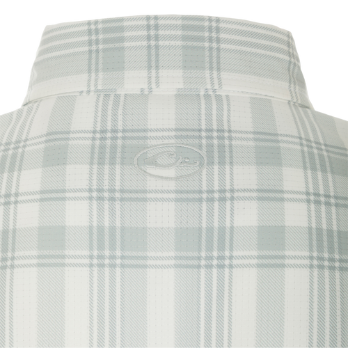 Frat Faded Plaid Short Sleeve Shirt: Lightweight, moisture-wicking fabric with built-in stretch for comfort and mobility. UPF 30 sun protection. Hidden button-down collar, vented cape back, and two chest pockets. Perfect for an active lifestyle.