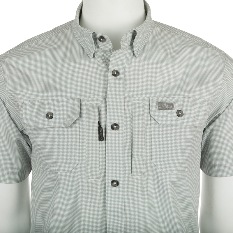 Frat Houndstooth Check Short Sleeve Shirt with hidden collar, chest pockets, and sunglass wipe for outdoor adventures.