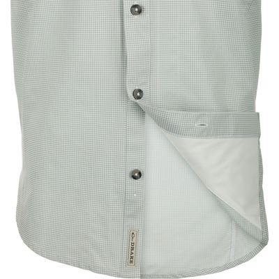 Closeup of Frat Houndstooth Check Short Sleeve Shirt with hidden collar, chest pockets, and vented back for outdoor adventures.