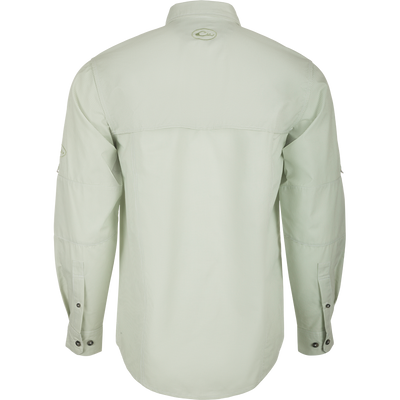 A technical houndstooth check button-down shirt by Drake Waterfowl. Features include UPF30 sun protection, moisture-wicking fabric, hidden collar, and vented cape back. Ideal for outdoor activities.