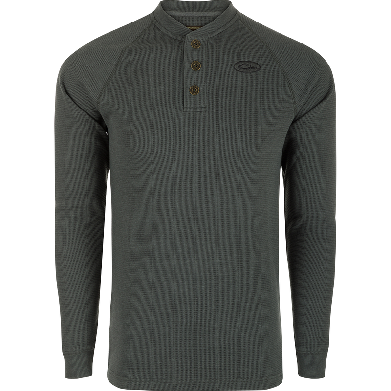 A durable Weston Lakes Waffle Henley in grey, featuring raglan sleeves, metal logo buttons, and rib knit details. Ideal for hunting and outdoor activities.
