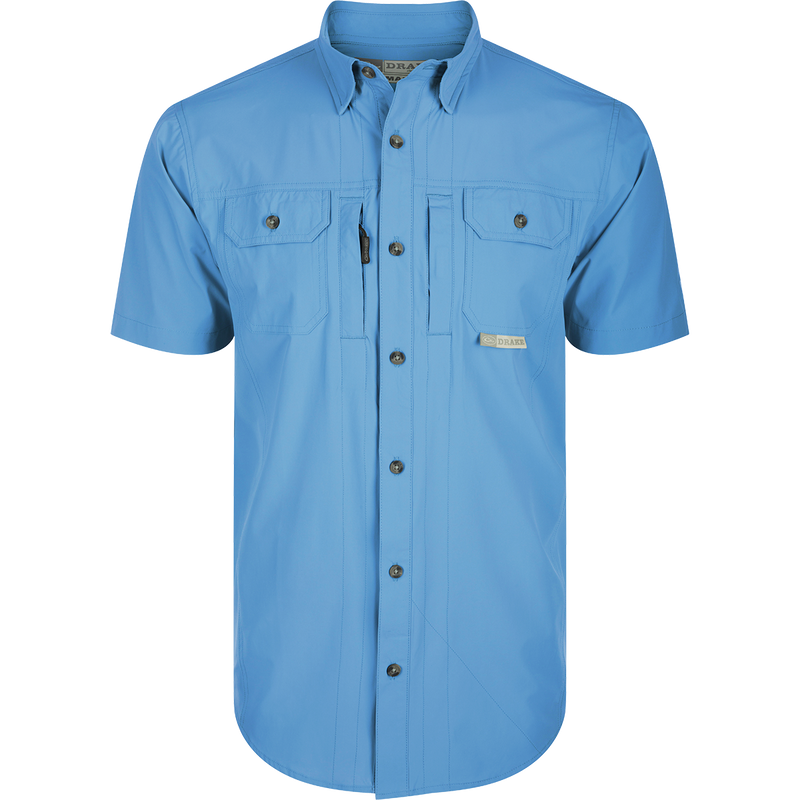 Wingshooter Trey Shirt S/S with hidden collar, vented back, and functional pockets, made of performance fabric for outdoor activities: Marina Blue