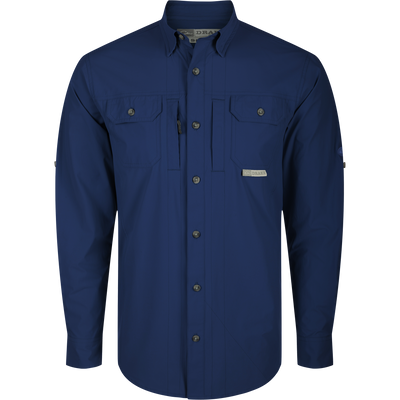 Wingshooter Trey Shirt L/S with long sleeves, hidden button-down collar, two chest pockets, vented cape back, and adjustable roll-up sleeves. High-performance fabric features.