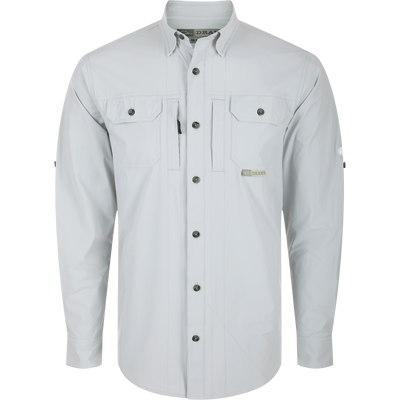 Long-sleeved white Wingshooter Trey Shirt with hidden button-down collar, two chest pockets, vented cape back, and adjustable roll-up sleeves.