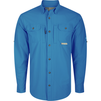 Wingshooter Trey Shirt L/S: A blue long-sleeved shirt with a hidden button-down collar, two chest pockets, and a vented back for moisture wicking and UPF 30 sun protection.
