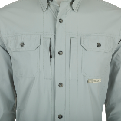 Close-up of a Drake Wingshooter Trey Shirt L/S featuring a button-down collar, chest pockets, and vented back for enhanced performance and comfort.