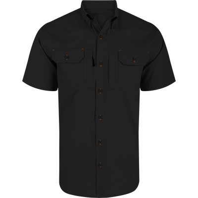 Wingshooter Trey Solid Short Sleeve Shirt featuring orange buttons, button-down collar, vented cape back, and dual flap chest pockets with hidden closures for versatile wear.
