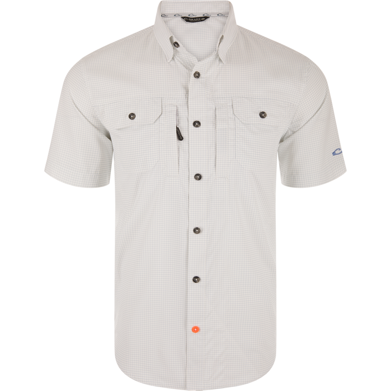 Wingshooters Trey Grid Check Short Sleeve Shirt with a classic fit, ventilated back, two flap chest pockets, and hidden zippered pocket, ideal for performance and outdoor activities.