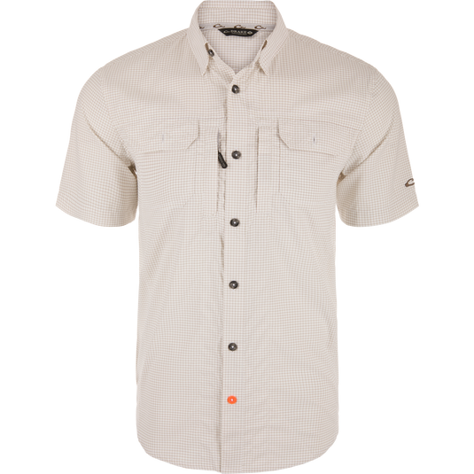 Wingshooters Trey Grid Check Short Sleeve Shirt on mannequin, featuring button-front, two chest pockets, button-down collar, vented back, and hidden zippered pocket.