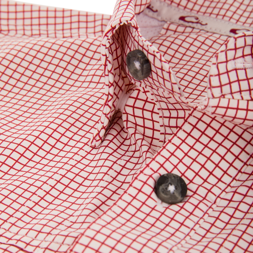 Close-up of the Wingshooters Trey Grid Check Short Sleeve Shirt, featuring a fine red grid pattern, smoky gray buttons, and a button placket.