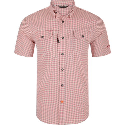Wingshooters Trey Grid Check Short Sleeve Shirt features a red-and-white micro-check pattern, button-down collar, flap chest pockets, and vented back for enhanced performance.