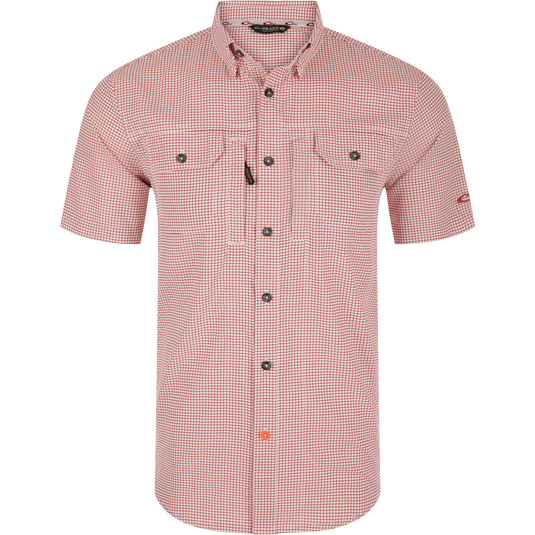 Wingshooters Trey Grid Check Short Sleeve Shirt features a red-and-white micro-check pattern, button-down collar, flap chest pockets, and vented back for enhanced performance.